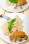 Italian Gnocchi With Seafood Sauce With Crab And Basil Stock Photo