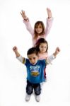 Playful Children Standing In Row Stock Photo