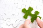 Green Puzzle Piece Stock Photo