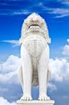 Antique Guardian Lion Sculpture On Blue Sky Background Stock Photo