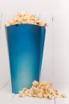 Blue Box Full Of Sweet And Tasty Popcorn Stock Photo