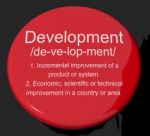 Development Definition Button Stock Photo