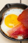 Egg Sunny Side Up With Italian Speck Ham Stock Photo