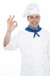 Male Chef Showing Ok Gesture Stock Photo