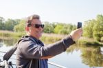 Elderly Man Makes Selfie Mobile Phone Stock Photo