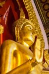 Golden Buddha Statue In The Church Stock Photo