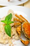 Italian Gnocchi With Seafood Sauce With Crab And Basil Stock Photo