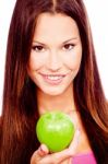 Happy Woman With Green Apple Stock Photo