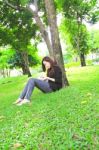 Young Woman Reading Stock Photo