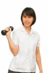 Healthy Woman Lifting A Dumbbell Stock Photo