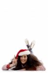 Pointing Girl Wearing Christmas Hat Stock Photo