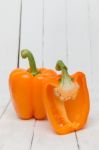 Fresh And Colorful Orange Bell Peppers Stock Photo