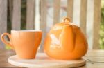 Ceramic Cup Of Tea And Teapot Stock Photo