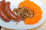 Beef Sausages Cooked On Iron Skillet Stock Photo