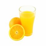 Glass Of Orange Juice And Riped Fruit Side On White Background Stock Photo