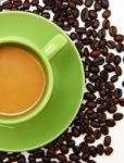 Cup Of Coffee With Beans Stock Photo