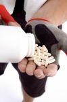 Man Taking Capsules On Hand Stock Photo