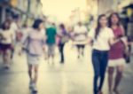 Blurred People Walking On The Street Of Old Town Stock Photo