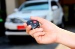 Women Hand Holding Car Key Stock Photo