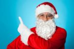 Father Christmas Pointing Away, Copy Space Area Stock Photo