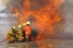 Fireman. Firefighters Fighting Fire During Training Stock Photo