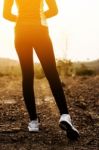 Woman Exercising Outdoor At Sunset  Stock Photo