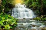 Mun Dang Waterfall In Deep Forest Fresh Green Rain Season In Tha Stock Photo