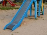 Children Playground, Swing Near The House  Stock Photo