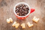 Smile Alphabet Biscuit With Red Coffee Cup Stock Photo