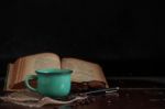 Coffee And Books On Desk Stock Photo