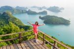 Woman On The Peak Mountain Stock Photo