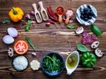 The Ingredients For Homemade Pizza On Shabby Wooden Background Stock Photo