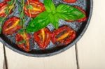 Baked Cherry Tomatoes With Basil And Thyme Stock Photo