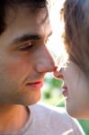 Outdoor Portrait Of Young Caucasian Couple At The Park Stock Photo