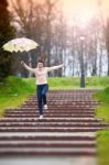 Happy Girl With Umbrella Stock Photo