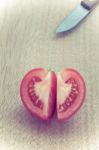 Half Cut Cleave Of Red Potato,look Like Heart Shape,with Knife O Stock Photo