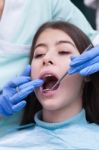 Young Woman At The Dental Office Stock Photo