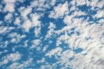 Clouds And Blue Sky Background Stock Photo