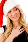 Smiling Woman Wearing Christmas Hat Stock Photo