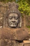 Statue Of Ancient Khmer Warrior Head At Angkor Wat Stock Photo