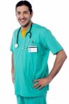 Doctor Sstanding With Hands On Waist Stock Photo