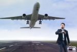 Young Business Man Standing In Airport Runways With Belonging Lu Stock Photo