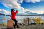 Woman Take A Photo At Fuji Mountains. Autumn In Japan. Travel Concept Stock Photo