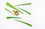 Aloe Vera Fresh Leaves With Aloe Vera Gel On Wooden Measuring Sp Stock Photo