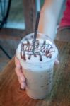 Take-home Ice Coffee Cup On Wooden Table Stock Photo