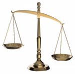 Gold Scales Of injustice Stock Photo