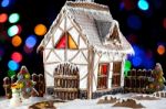 Gingerbread House And Snowman Stock Photo