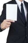 Businessman Holding Blank Paper Stock Photo