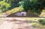 Sign At The Entrance To The National Park In Marsabit Kenya Stock Photo