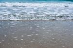 Sand Beach With Blue Ocean Stock Photo